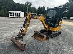 Cat 301,8 inkl. Powertilt, Löffelpaket&Humbaur Tieflader